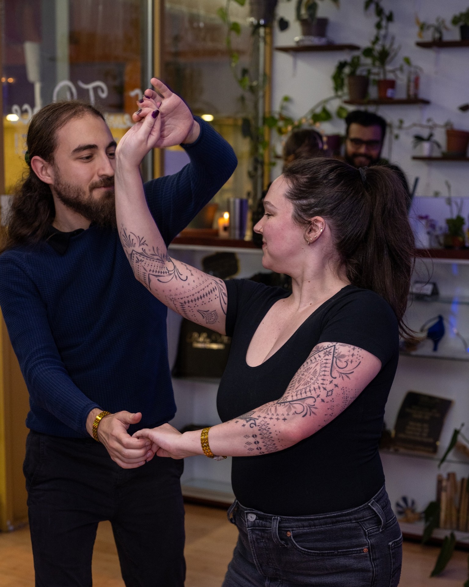 Couple practicing bachata moves at NH Latin dance studio